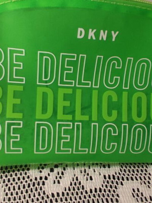 DKNY Be Delicious toiletry bag like new, waterproof, green