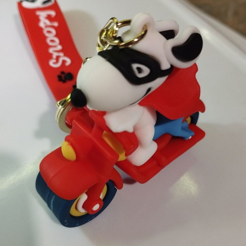 Snoopy figure on motorcycle new, collectible