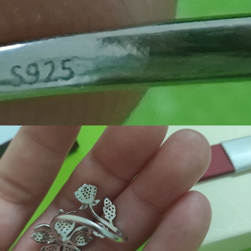 Silver 925 ring used, resizable, flower design