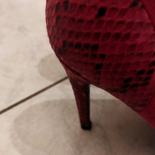 Red leather pumps used, size 39