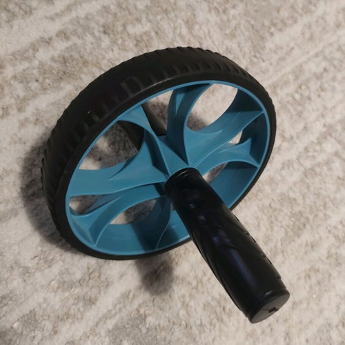 Fitness wheel like new for training back, chest, arms, abs, and legs