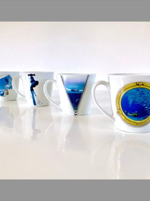 Illusion porcelain mugs set of 4 like new