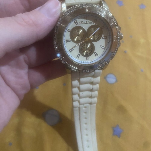 Women's watch like new, simple, gold color