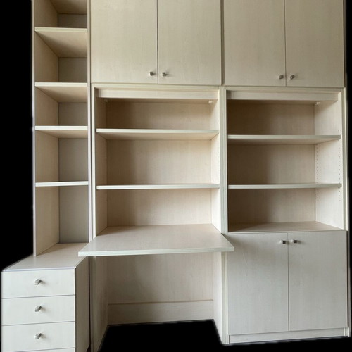 Bookcase desk with shelves, cabinets, drawers and office chair used