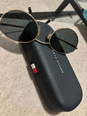 Tommy Hilfiger sunglasses with gold frame and dark lenses