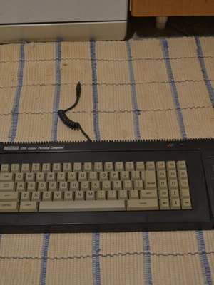 Amstrad CPC 6128 with green GT 65 monitor and Gotek drive used