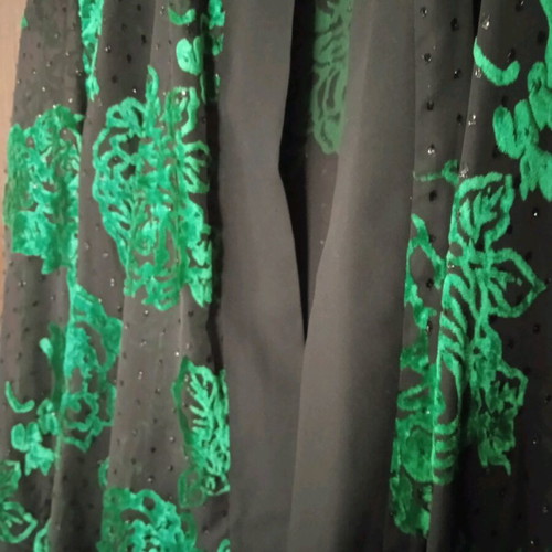 Women's tunic like new, black with green flowers