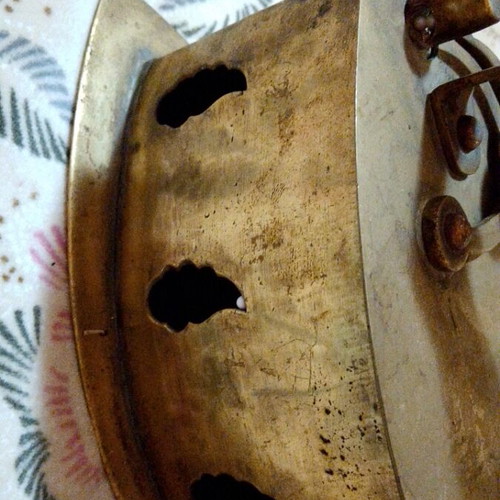Vintage brass coal iron in golden tone, like new