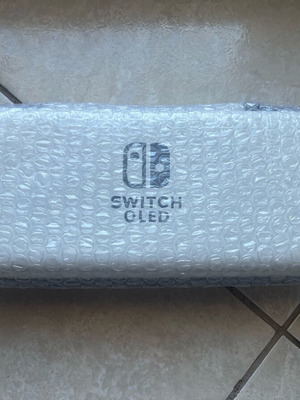Nintendo Switch OLED case and screen protector new