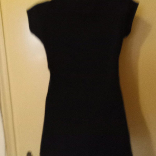 Black t-shirt with treble clef print used, size M