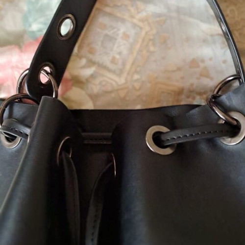 Pink Woman black bucket bag used, soft faux leather with metal details