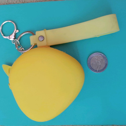 Pokémon keychain wallet used, yellow silicone