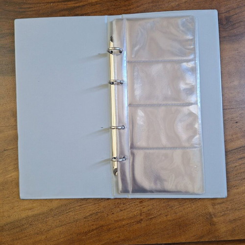Card binder for phone cards new, 8 sleeves, 64 slots
