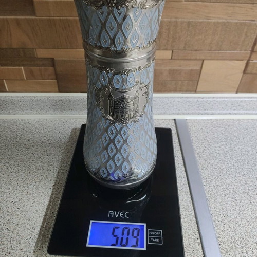 Vintage decorative vase used with silver-plated body and blue enamel