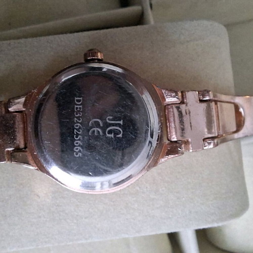 Rose gold-tone women's watch used, good condition