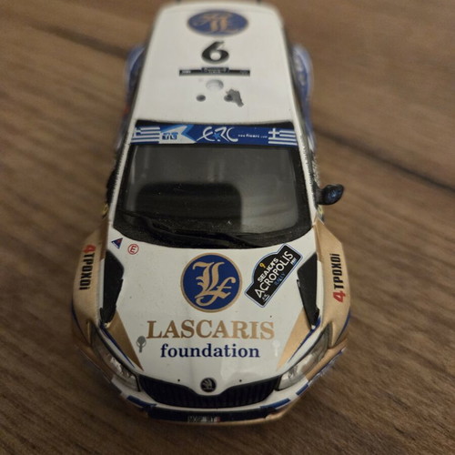 Scoda Fabia RS 1/43 model car, like new, missing roof flag and right mirror