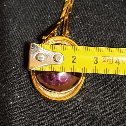Pendant with spiral design and crystal, like new
