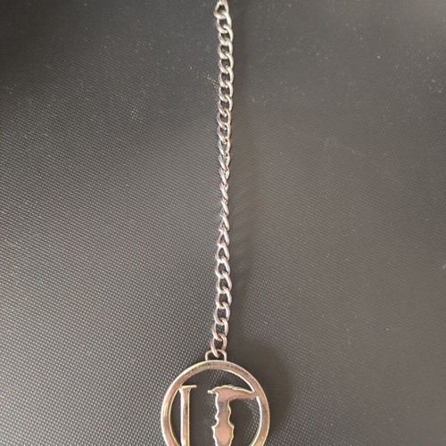 Trussardi bag charm new, silver and gold tone