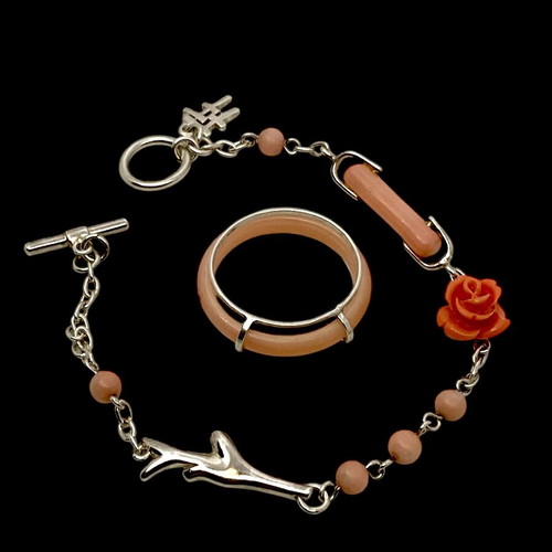 Silver bracelet with coral new, pink and orange