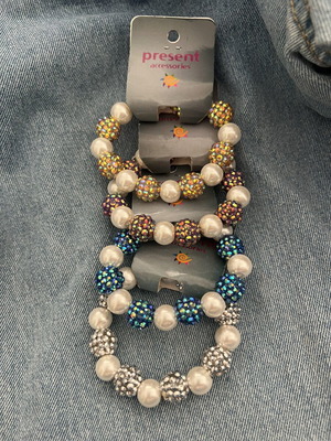 Bracelets new, set of 4, black and silver colors