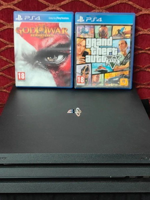 PlayStation 4 Pro 1TB like new with controller and 2 games