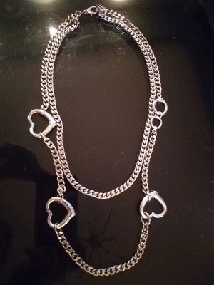 Steel necklace used with long double chain and hearts