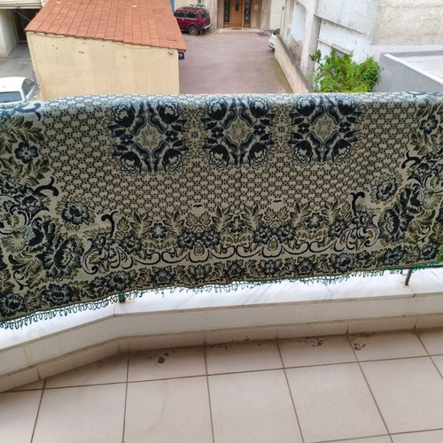 Woven green blanket used 178x125 without fringes