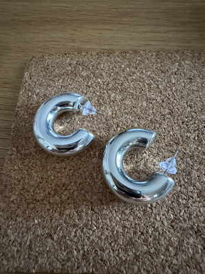 Thick steel hoop earrings like new, silver color