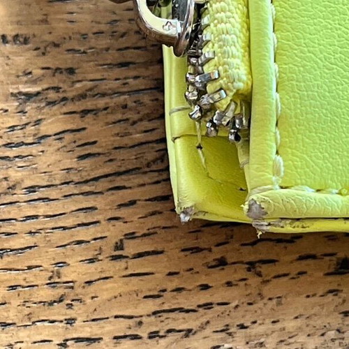 Axel wallet used in bright lime color