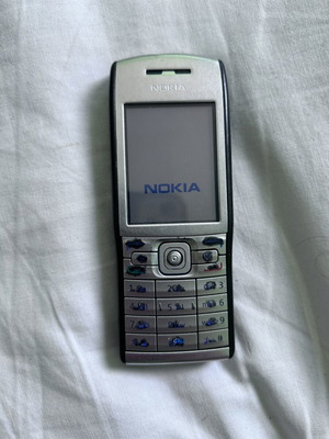 Nokia E50 phone used, battery swollen, functional