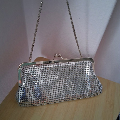 Small silver evening clutch bag used