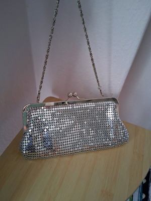 Small silver evening clutch bag used