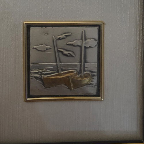 Decorative frame with embossed metal artwork used, made in Italy