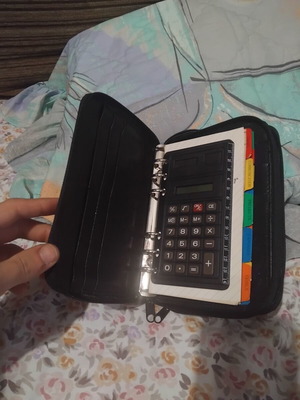 Organizer agenda with zipper used, black color, internal dividers