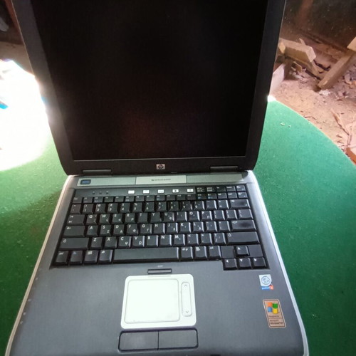 HP Omnibook XE 4500 laptop used with charger, bag and cooling pad
