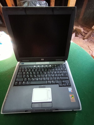 HP Omnibook XE 4500 laptop used with charger, bag and cooling pad