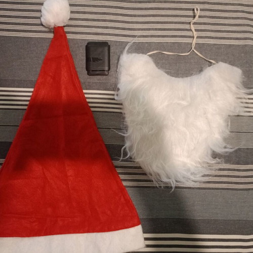 Santa Claus costume like new, large size with jacket, pants, hat, belt, and beard