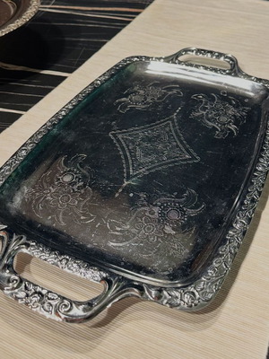 Vintage rectangular silver-plated serving tray used with engraved floral designs