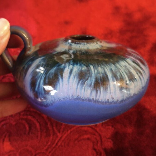 Handmade ceramic candlestick with reactive glaze finish
