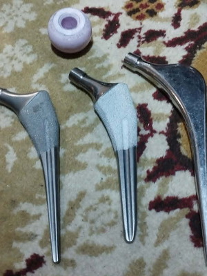 Total hip arthroplasty components, three metal femoral stems and ceramic head