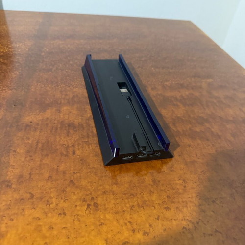 PlayStation 4 stand like new with USB ports and blue LED light