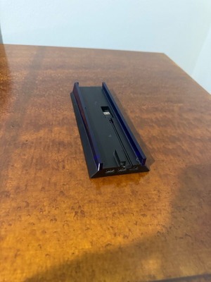 PlayStation 4 stand like new with USB ports and blue LED light