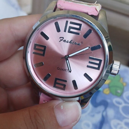 Fashion pink watch with silver used, slight wear