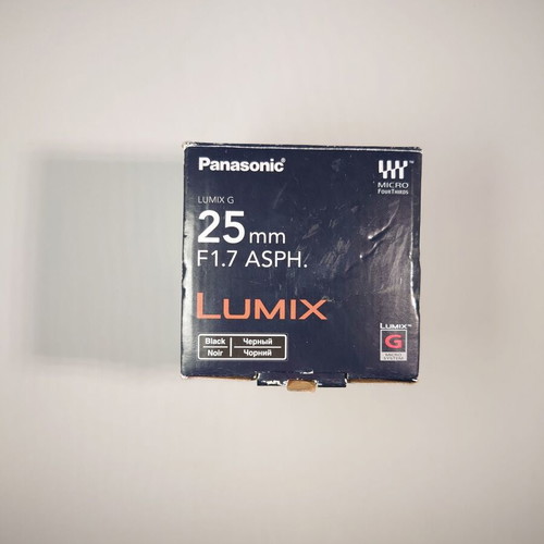 Empty box and manuals for Panasonic Lumix-G 25mm f/1.7 ASPH lens used
