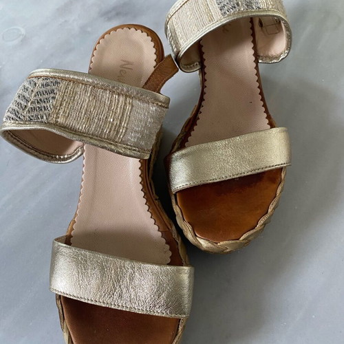 Beige platforms with woven heel and gold details like new