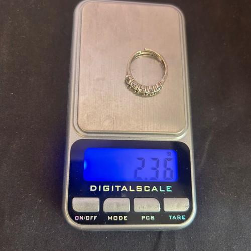 Silver ring with white stones like new
