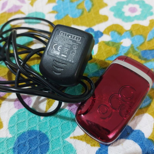 Alcatel vintage flip phone used, red, charger included
