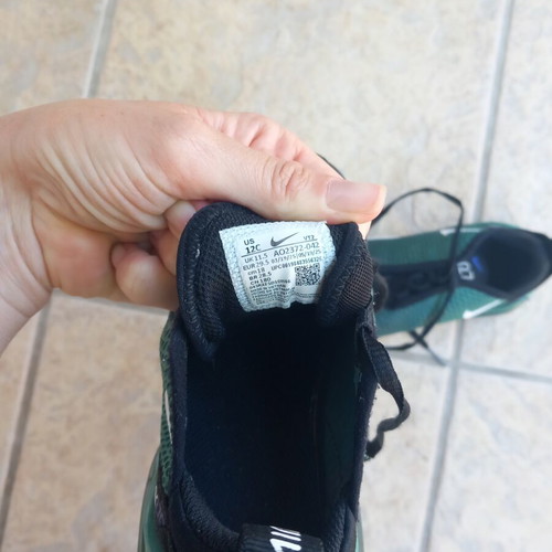 Nike kids athletic shoes like new, size 29.5, black and green