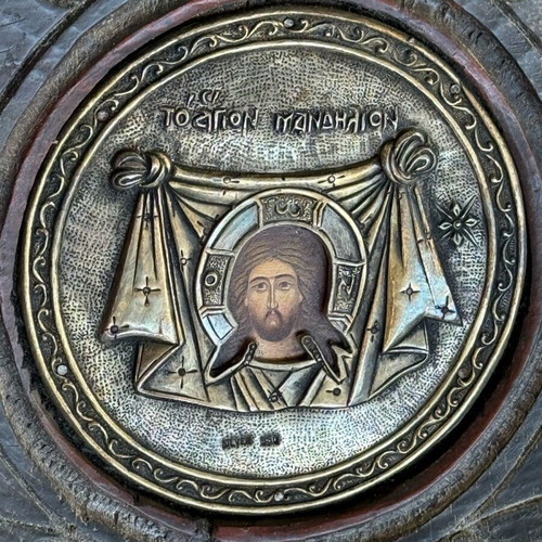 Handmade wooden trough with Orthodox icon used