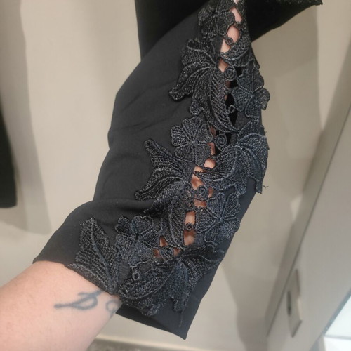 Pants black with lace side openings, like new, size M
